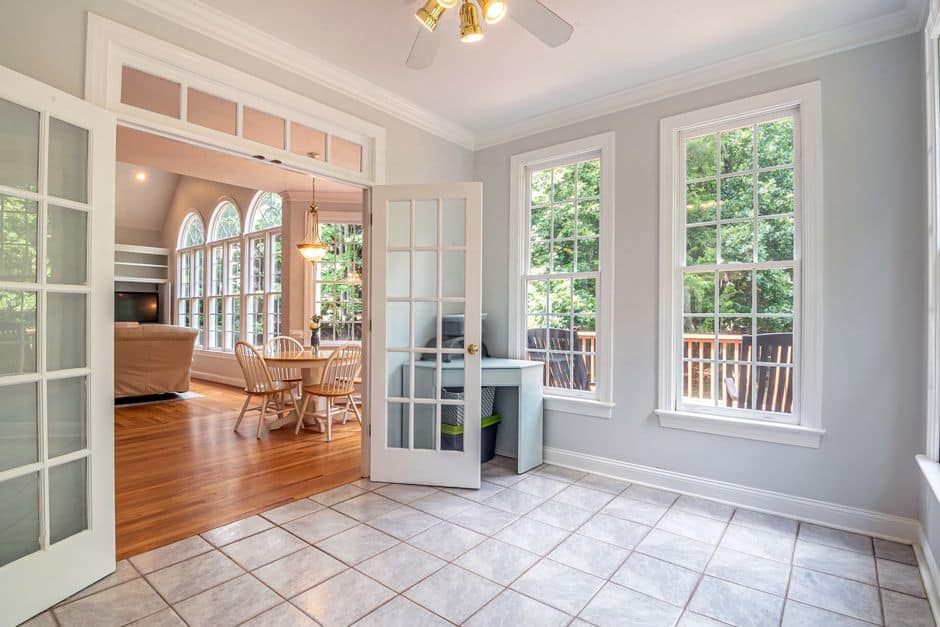 Bright room with open white French doors