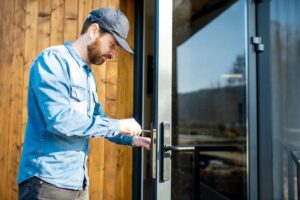 Man installing doors without frame