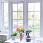 Stylish room interior with french doors and light neutral colour