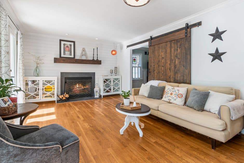 Sliding barn door in a bright living room