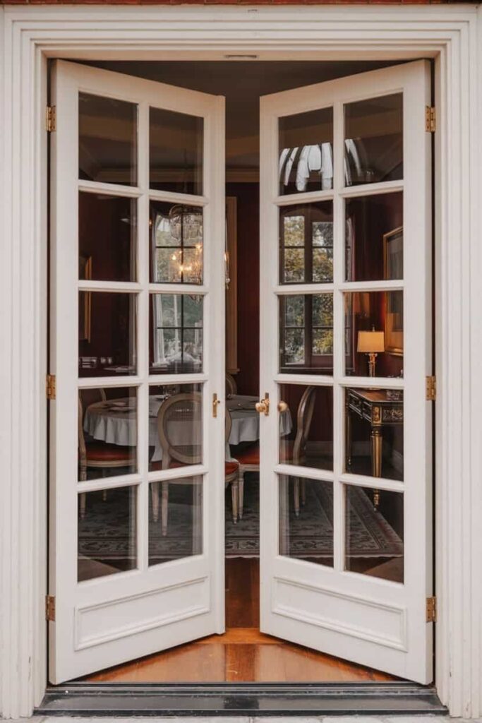 double French doors with clear glass panels and sidelights