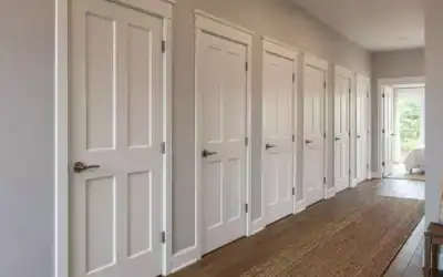 How to Make Several Room Doors Along One Hallway Feel More Cohesive