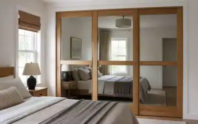 Mirrored Closet Doors Wrapped in Oak to Look Like Real Wood Panels